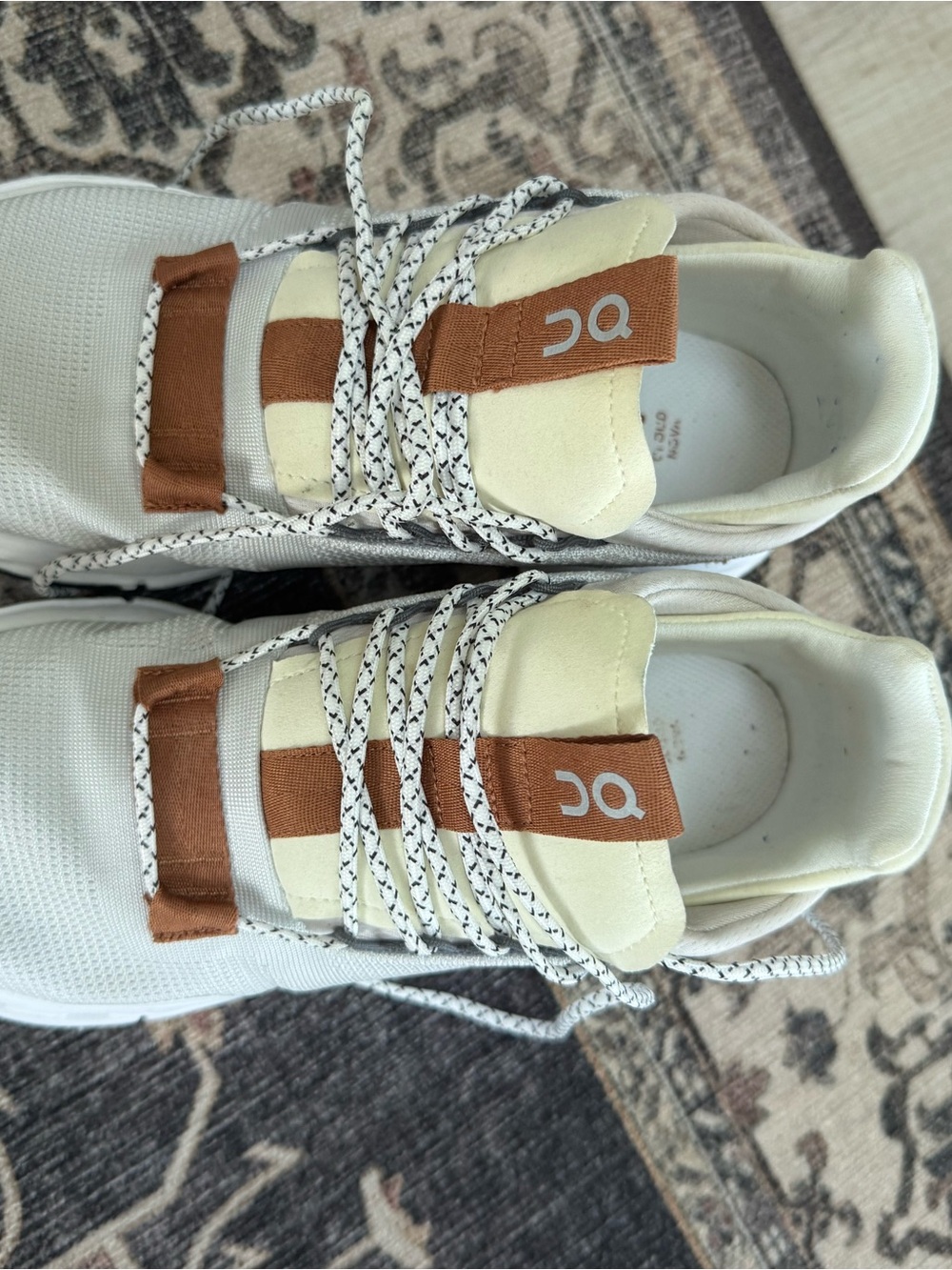 On Running womans Sneakers in White and Brown with Patterned Laces